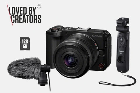 Appareil photo hybride Canon EOS R50 V + Optique RF-S 14-30mm pour Système EOS R + Poignée-Trépied HG-100TBR avec commande a distance Bluetooth + Microphone DM-E100 + Carte SD 128 GB