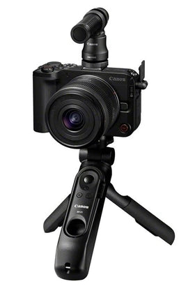 Appareil photo hybride Canon EOS R50 V + Optique RF-S 14-30mm pour Système EOS R + Poignée-Trépied HG-100TBR avec commande a distance Bluetooth + Microphone DM-E100 + Carte SD 128 GB